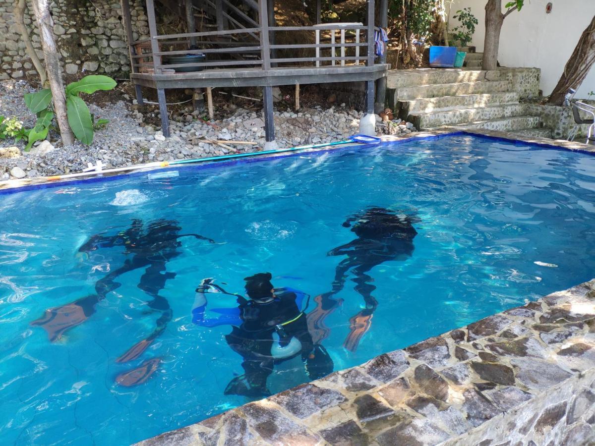 บลู ริบบิ้น ไดฟ์ รีสอร์ต Hotel มาบีนี ภายนอก รูปภาพ