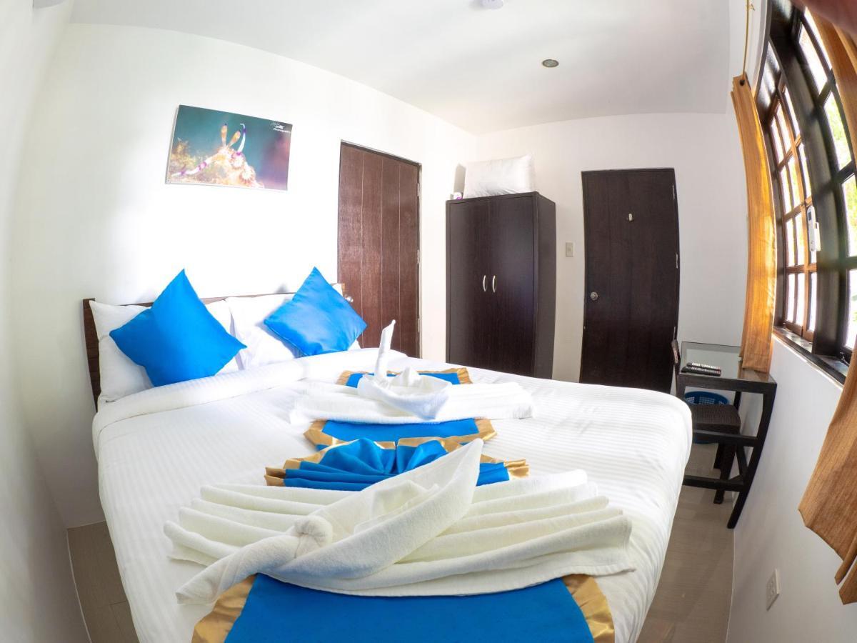 บลู ริบบิ้น ไดฟ์ รีสอร์ต Hotel มาบีนี ภายนอก รูปภาพ